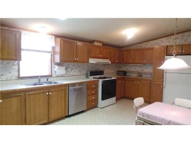 Kitchen. An abundance of kitchen counters and cupb