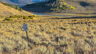 View of mountain backdrop with a large body of water