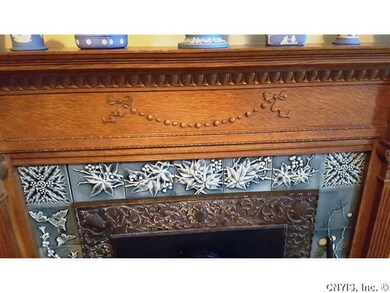 Living Room. Detail on the Mantel of the Fireplace