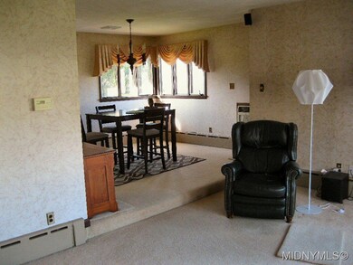 Living Rm open to Dingin Room