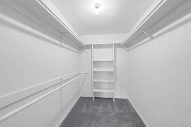 Both bedrooms feature spacious walk-in closets