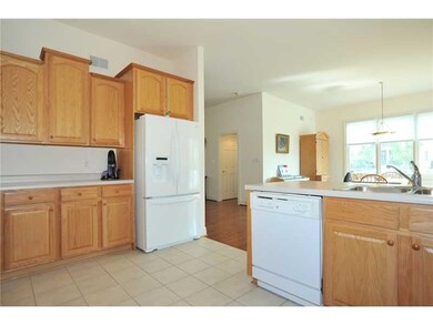Kitchen. Bright windows are everywhere.  Entire ho