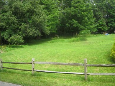 Exterior Front. View of front yard with lush lawns
