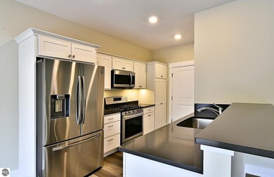 7459 E Meadows Dr, Cedar, MI 49621 - photo 2