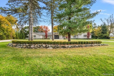 View of front of property featuring a front lawn
