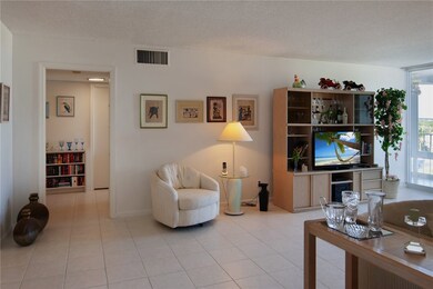 The hallway is leading to the master suite (right)