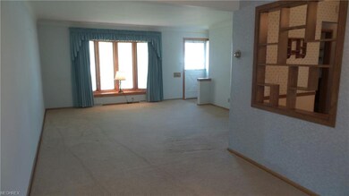 This is Liv Rm/Din area with shadow box into Kitchen.  The bow window is really beautiful with a wood bench area, perfect for holiday decorations.