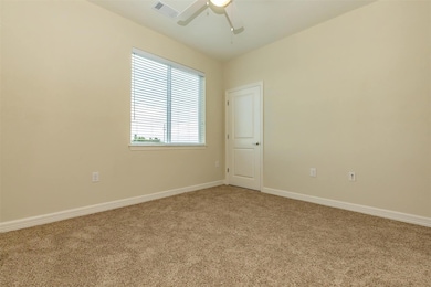 Unfurnished room with light carpet, baseboards, v