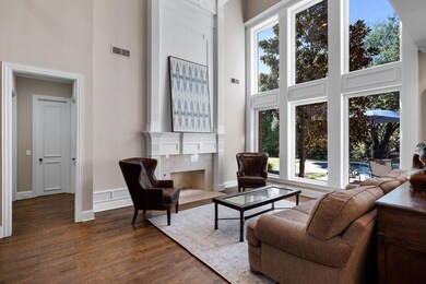Living room with dark hardwood / wood-style floori