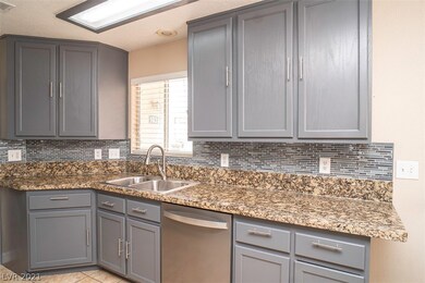 Granite countertop, back splash that matches cabin