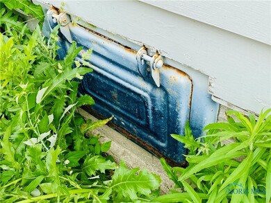 Step back in time with this vintage coal chute, a