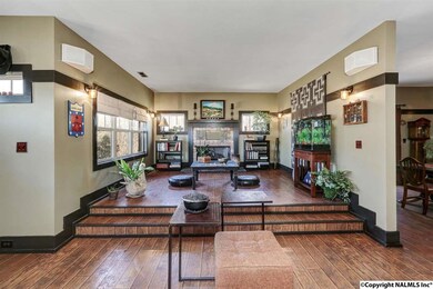 Raised area on the east side of Living room with fireplace