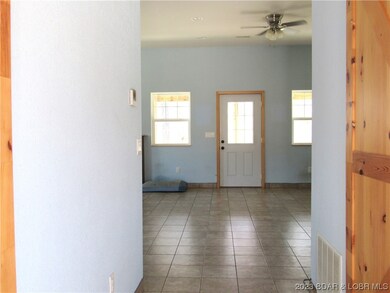 As you enter the home, barn doors on both sides.