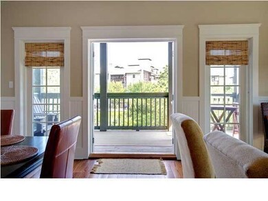French doors open onto porch