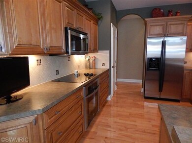 7506 Whistlepipe Ct SW, Byron Center, MI 49315 - photo 5