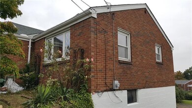 Side View with fresh paint along foundation