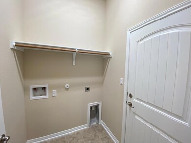 Laundry room with electric dryer hookup, hookup f