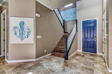 Entryway with freshly painted staircase