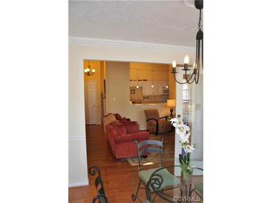 View from Dining Area into Great Room and Kitchen