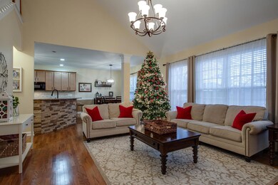 Another view of the living area open to kitchen prep and dining areas.