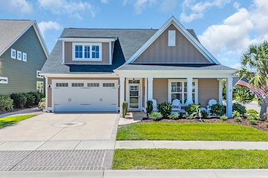 View of front of house with in ground irrigation throughout the yard.