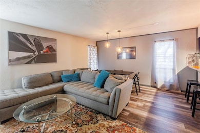 Living area with wood finished floors