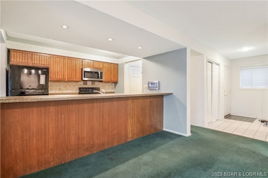 Raised bar holds a multitude of bar stools! Great