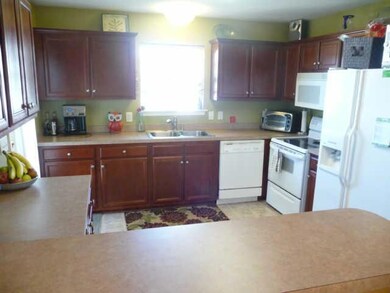 Lots of cabinets and counter space in this kitchen.
