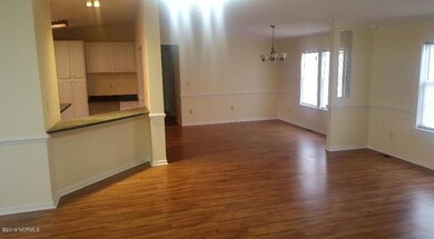 View of living room and dining room