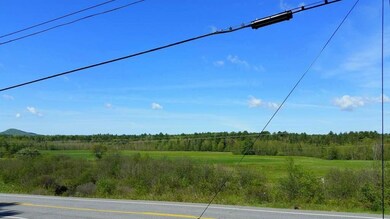View of the neighbor's field across...