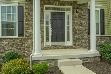 Beautiful front entry with stone veneer.