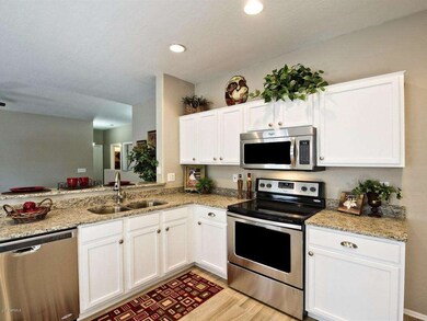 Granite Counters, Refinished Cabinets