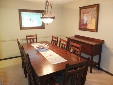 Formal dining room with chair rail.