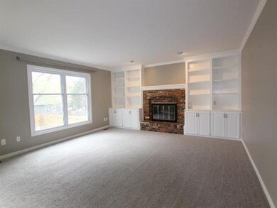 GREAT ROOM - NEW Carpet - Fireplace - Built-Ins