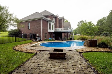 View of pool and house