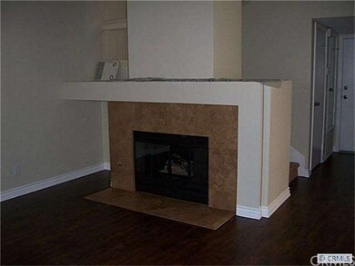 Custom fireplace. All new vinyl windows too!