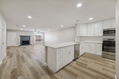 View of the open layout, with kitchen and living areas.