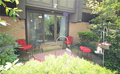INVITING ENTRYWAY WITH NEWER STONE PATIO
