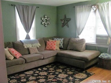 Living Room. Two windows allow sunlight to enter t