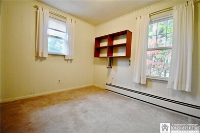 First floor bedroom        9' x 7'
