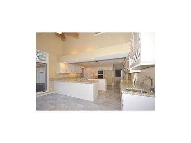 Freshly remodeled kitchen with granite counters, n