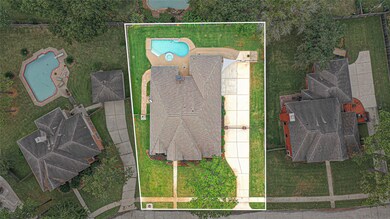 This home sits on a lot with ample yard space in front and the back, lush landscaping and well-maintained yard!
