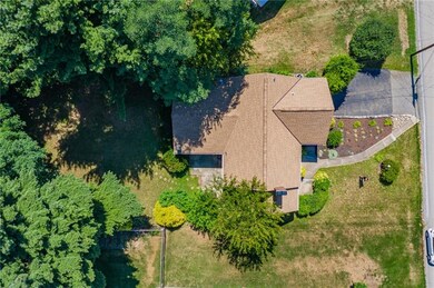 Great view to see the layout of the lot. Private rear yard, extra wide driveway space.  Hey that Roof is NEW!