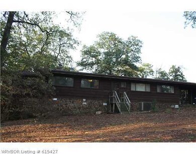 Exterior Back/Side. exterior back host a  nice sun porch, to watch the abundant wildlife