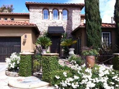 Beautiful, gated courtyard entrance