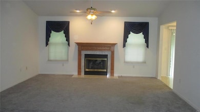 Living Room with newer carpet.