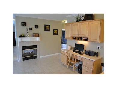 Kitchen. Built-in desk area & fire-place!