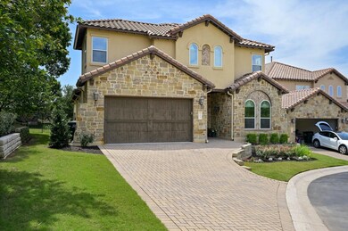 Mediterranean / spanish house featuring stone sid