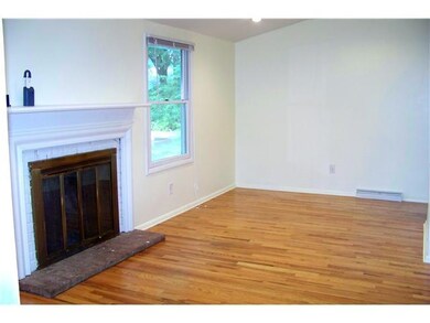 Family Room. Family rm with woodburning fplc, vaul