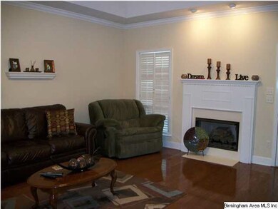 Notice the accent lighting above the fireplace and